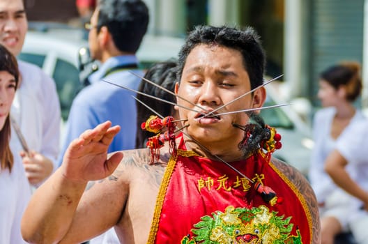 Phuket Vegeterian Festival. Shocking asian tradition - body piercing.