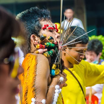Phuket Vegeterian Festival. Shocking asian tradition - body piercing.