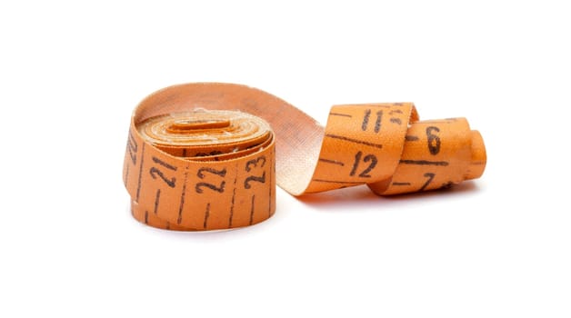 Measuring tape of the tailor isolated on white