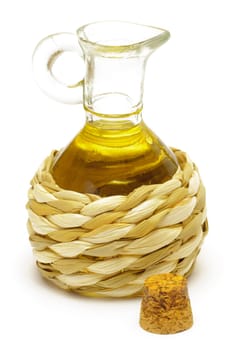 Decanter with oil isolated on white background