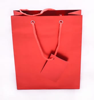 A red gift bag isolated.