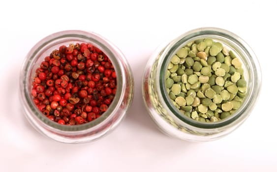 Variety of spices in a glass pot..