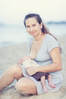 Mother breastfeeding a baby outdoor