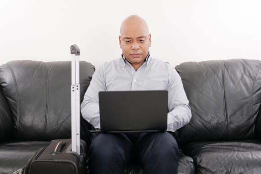 african travel businessman working in airport vip lounge