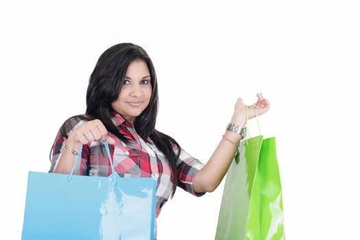 Beautiful shopping woman holding bags