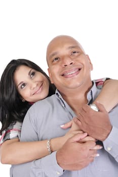 Thoughtful couple hugging and looking up - isolated over white.  Focus in the woman