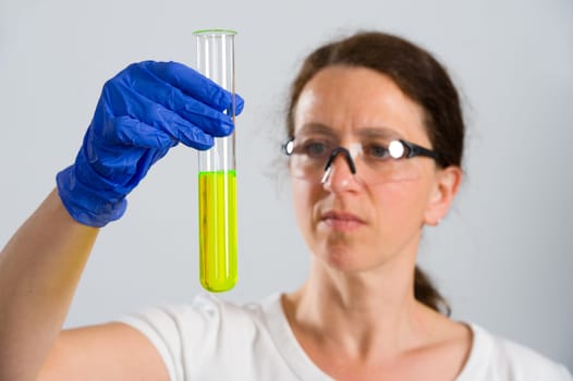 woman in laboratory with test tube