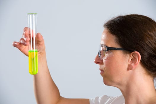 woman in laboratory with test tube