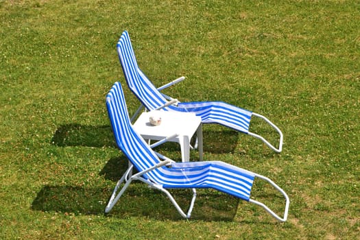 Sun loungers on a lawn
