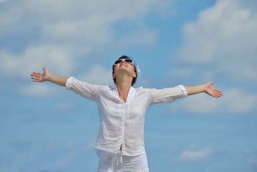 happy young woman on summer vacation on beautiful tropical beach have fun enjoy and relax