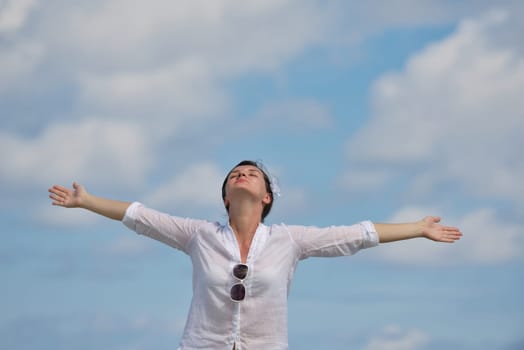 happy young woman on summer vacation on beautiful tropical beach have fun enjoy and relax