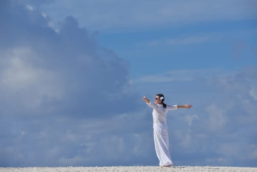 happy young woman on summer vacation on beautiful tropical beach have fun enjoy and relax