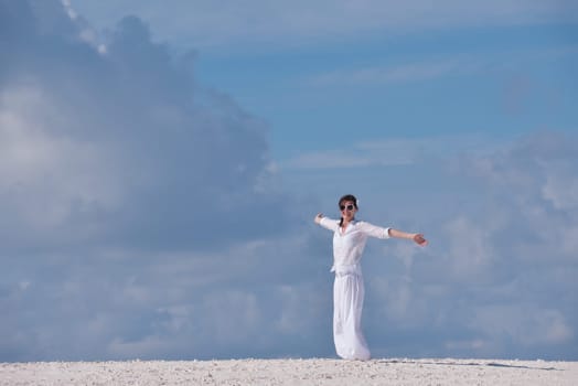 happy young woman on summer vacation on beautiful tropical beach have fun enjoy and relax