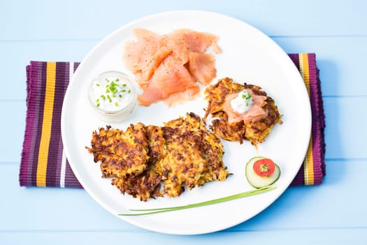 smoked salmon with potato pancakes and tartare sauce
