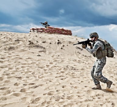 Two soldiers in the desert during the military operation