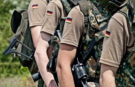 squad of german soldiers holding machine guns