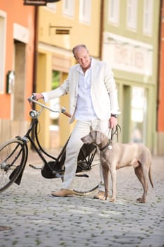 Man with dog and bicycle