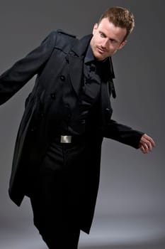Man with black coat