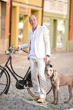 Man with dog and bicycle