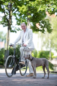 Man with dog and bicycle
