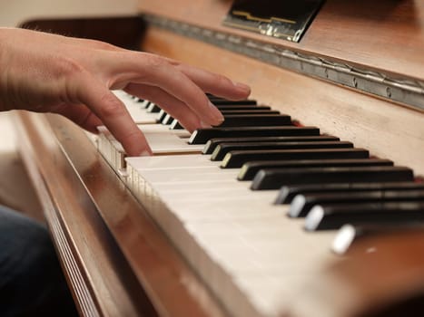 Playing an old upright piano