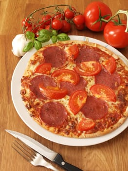Pizza on a wooden background
