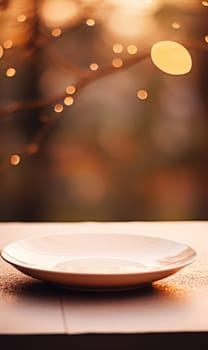 Empty plate on table with blurred background