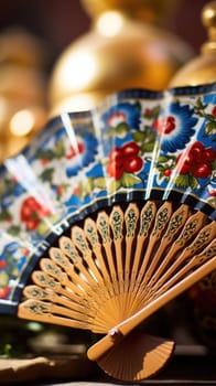 A close up of a fan with colorful designs
