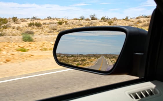 Car Mirror as seen from the drivers seat