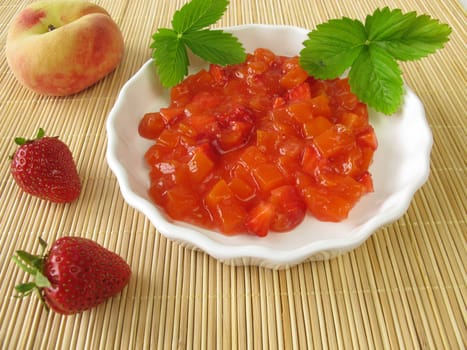 Red groats with strawberries and peaches
