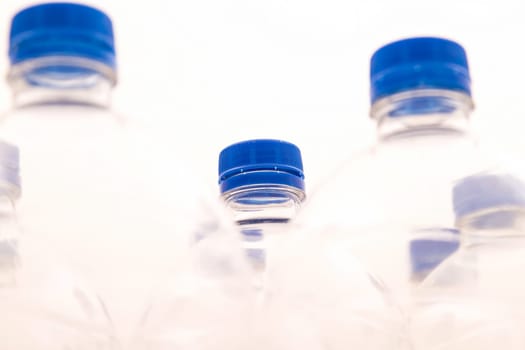 Empty bottles of mineral water .