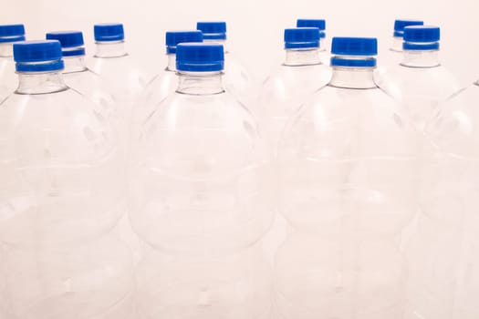 Empty bottles of mineral water .