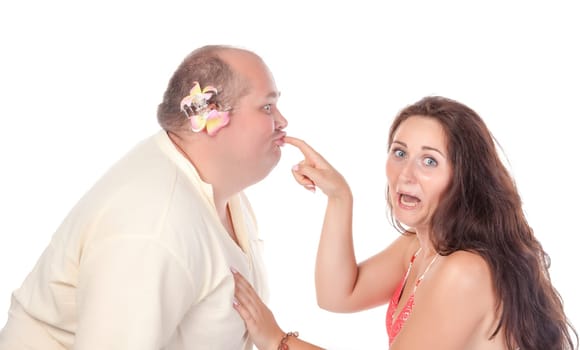 Young cheerful couple in summer clothes, have fun on white background