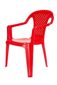 Red plastic chair isolated on a white background