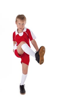 small footballer with red jersey
