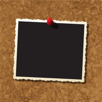 Photo frame on cork board