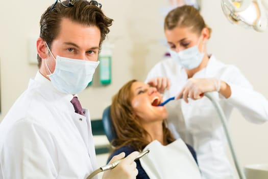 Dentist in his practice