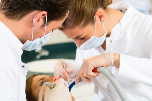 Dentist in his practice