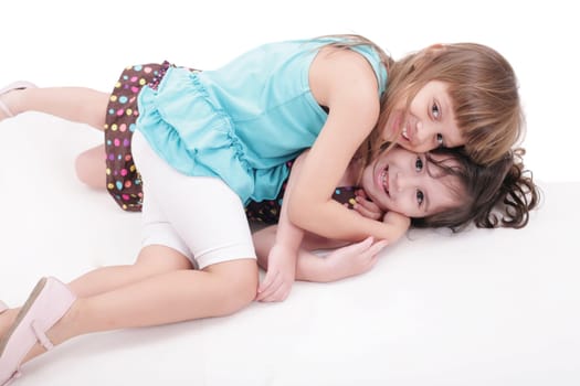 two kids play together, isolated on white background