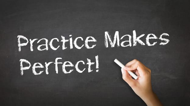 A person drawing and pointing at a Practice Makes Perfect Chalk Illustration