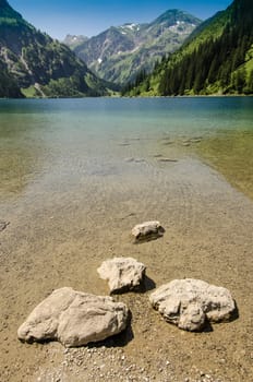 Lake Vilsalpsee and mountain in Tyrol Austria in portrait format