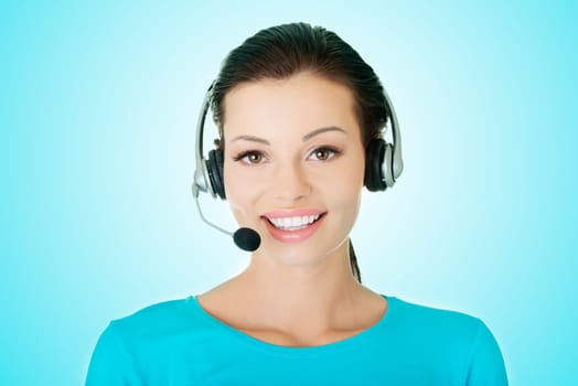 Beautiful young call-center assistant smiling