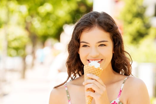 portrait of young woman eating ice cream,outdoor