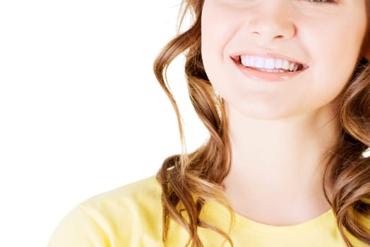 Beautiful woman with her perfect straight white teeth. Isolated.