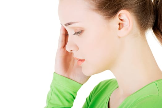 Young beautiful woman in depression,isolated on white