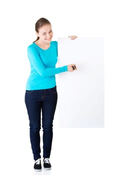 happy beautiful woman writing with a pen on blank board. student or businesswoman.