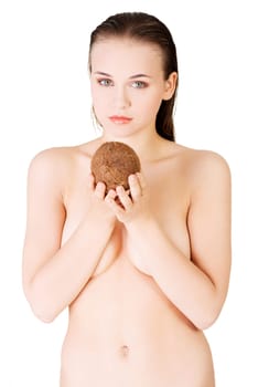 beautiful woman with coconut in hands over white background