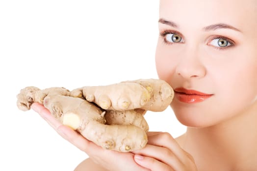 beautiful woman with fresh ginger,isolated on white