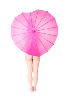 artistic shoot of beautiful nude woman under pink umbrella. isolated on white. feminism and woman health care concept.
