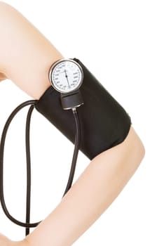 female hand with blood-pressure meter isolated over white